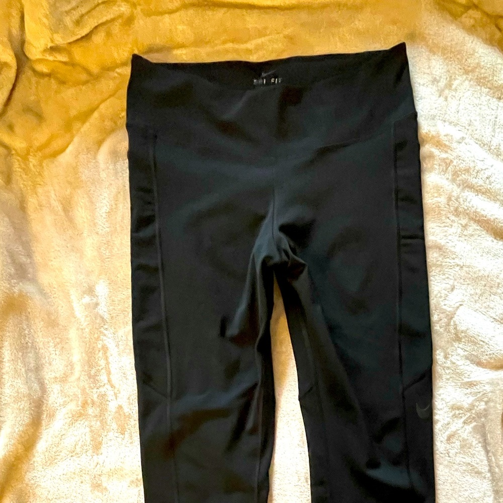 Nike Dri-Fit leggings. M. Sheer pockets & inner legs. Lots of stretch. Black.